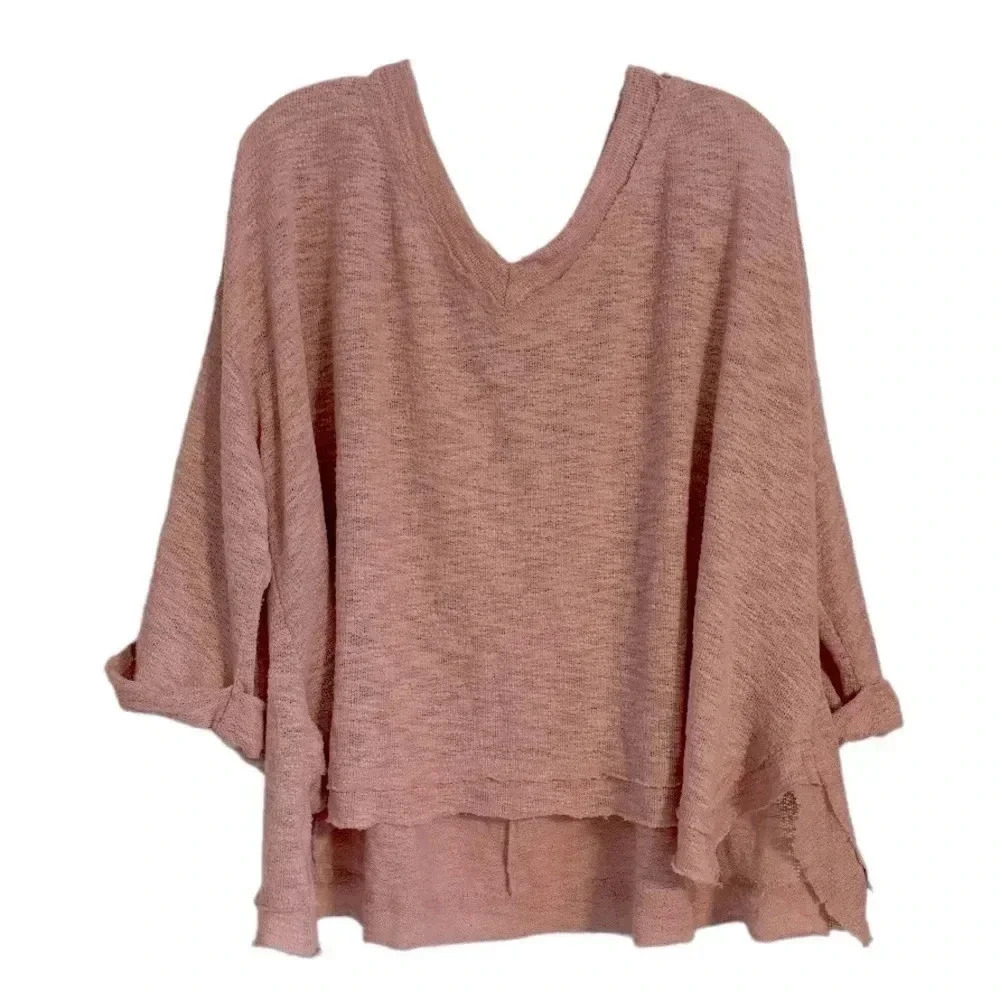 ADORA , size medium oversized sweater with a deep V-neckline and wide sl…